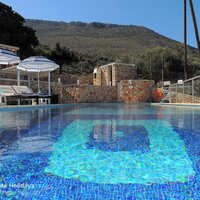 02 Kallithea 14m long pool with steps to dining terrace.